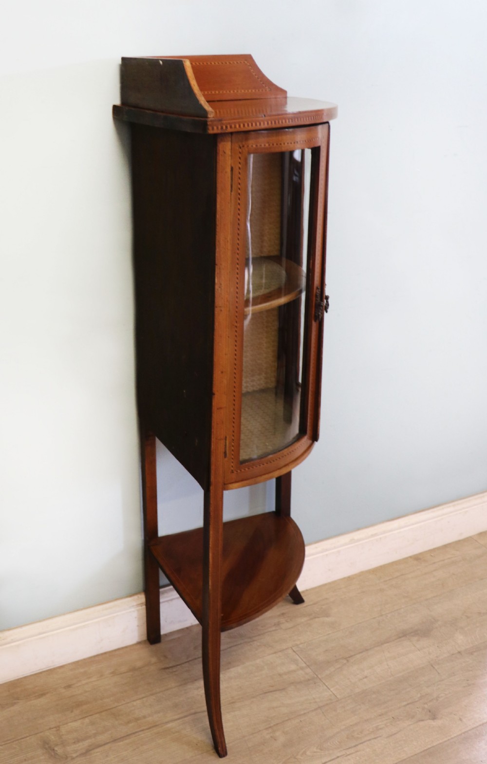  A lovely small Edwardian mahogany and inlaid corner display cabinet.  View VI