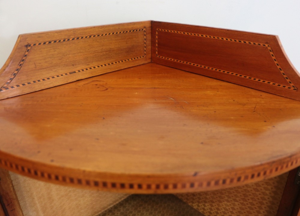 A lovely small Edwardian mahogany and inlaid corner display cabinet.  View VIII
