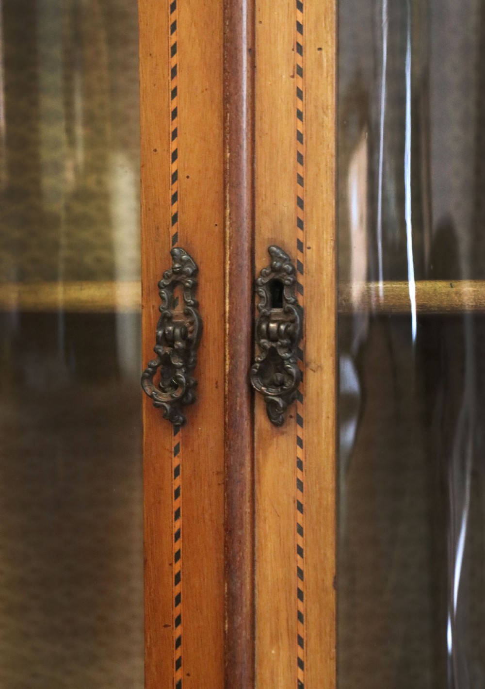  A lovely small Edwardian mahogany and inlaid corner display cabinet.  View XV