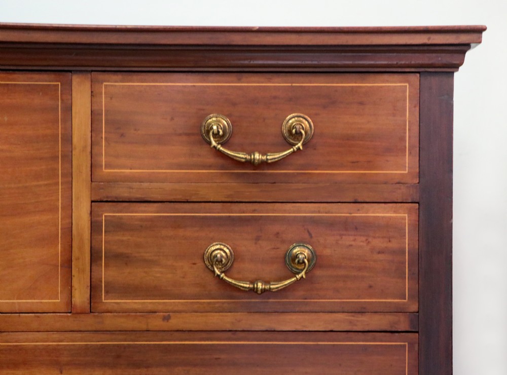 A lovely early 20th century, beautifully made mahogany chest of drawers. View IX