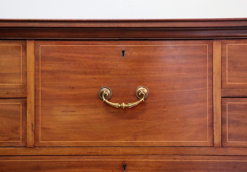 A lovely early 20th century, beautifully made mahogany chest of drawers. View XII