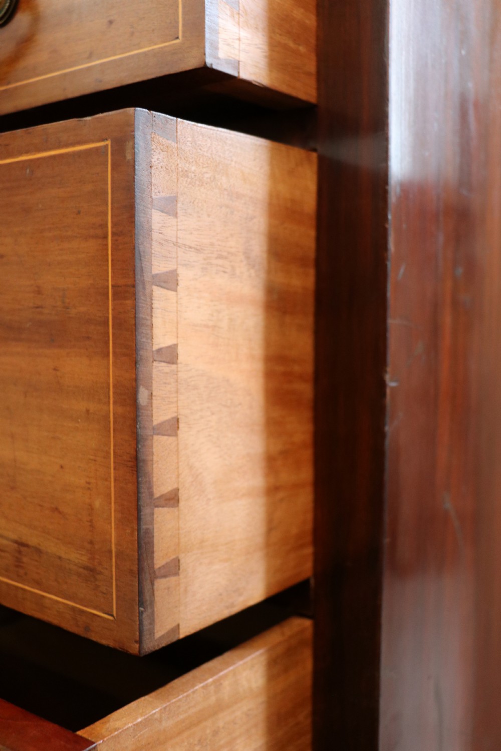 A lovely early 20th century, beautifully made mahogany chest of drawers. View XVIII