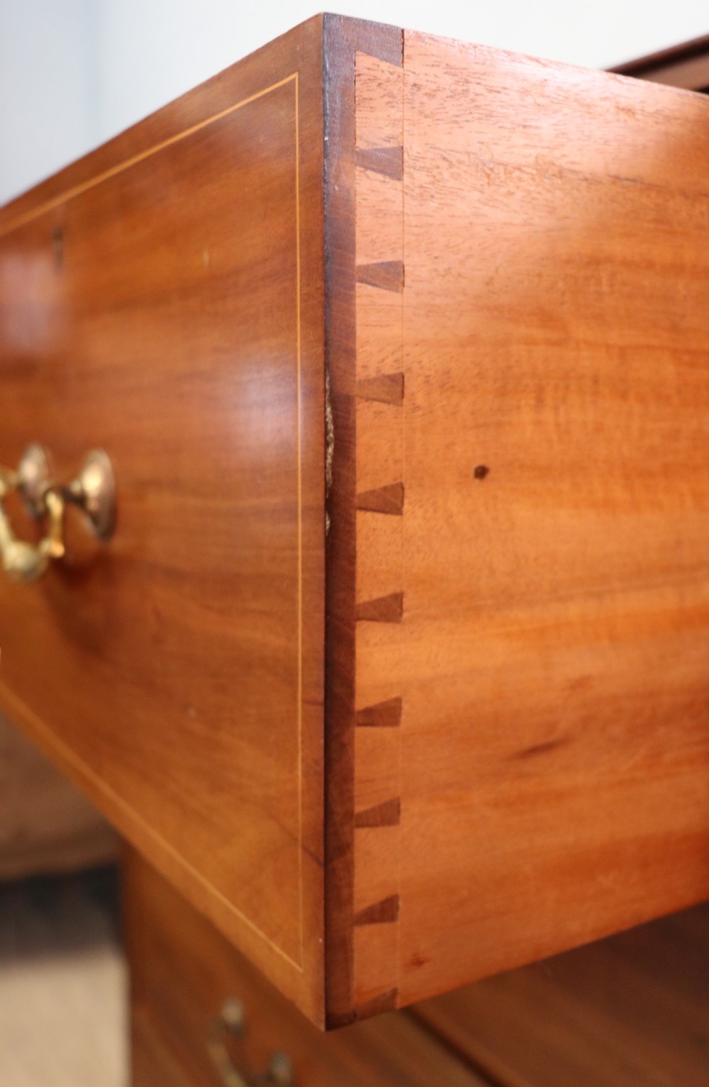 A lovely early 20th century, beautifully made mahogany chest of drawers. View XIX