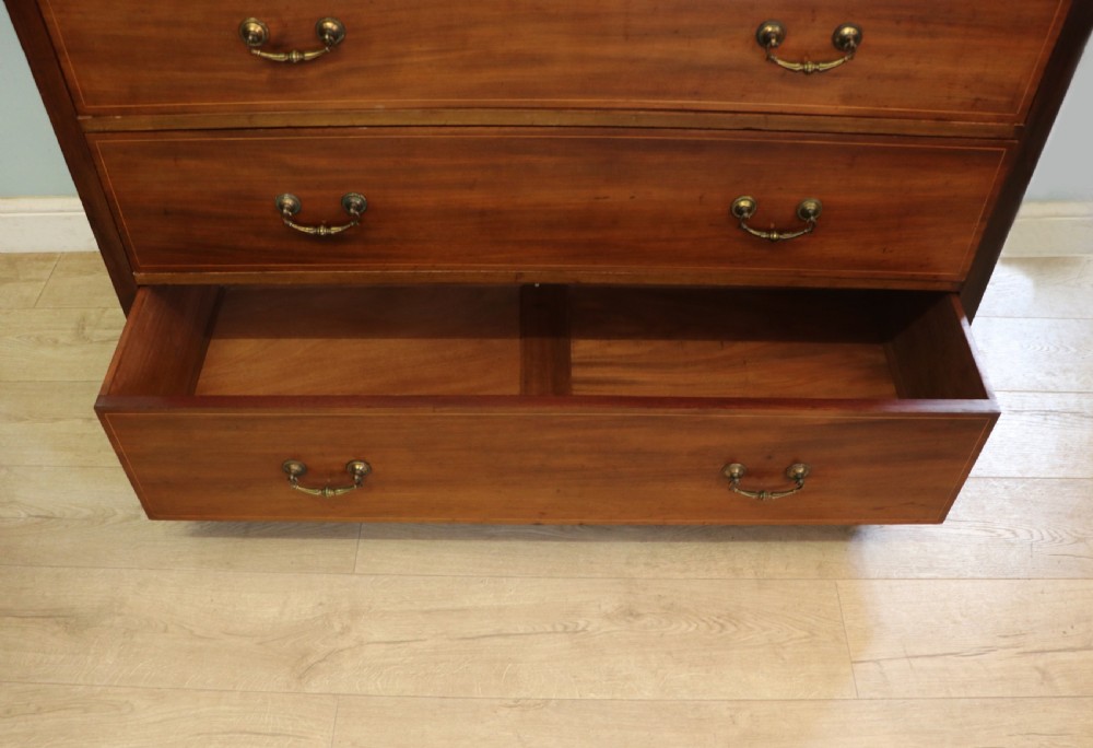A lovely early 20th century, beautifully made mahogany chest of drawers. View XXII