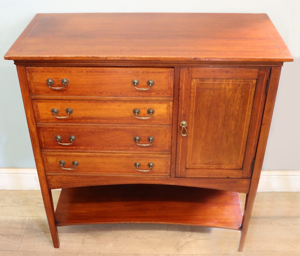 A wonderful early 20th century mahogany and inlaid combination music cabinet and cupboard. View II