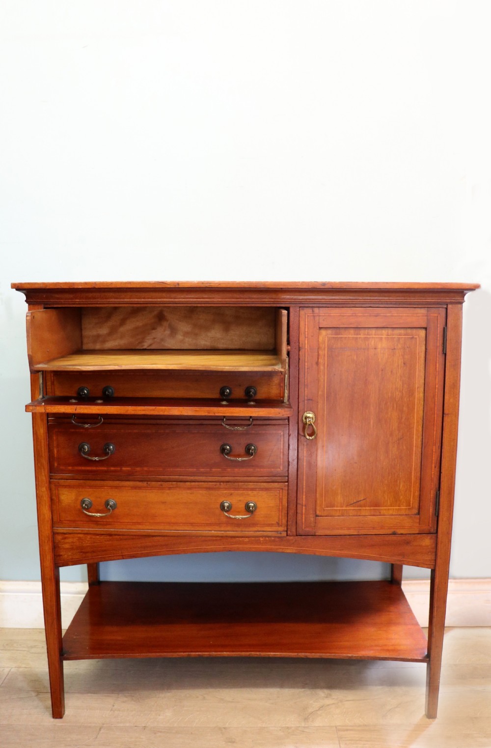 A wonderful early 20th century mahogany and inlaid combination music cabinet and cupboard. View III