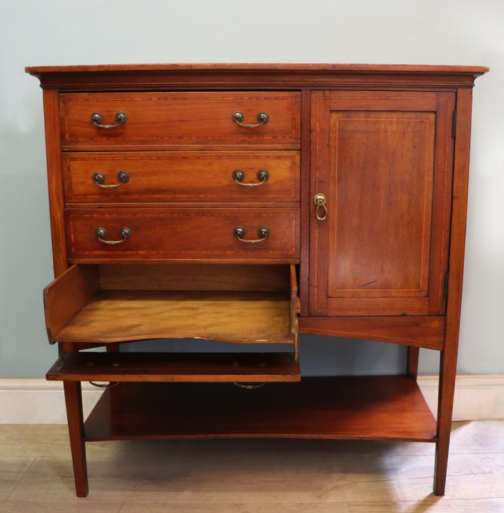 A wonderful early 20th century mahogany and inlaid combination music cabinet and cupboard. View VI