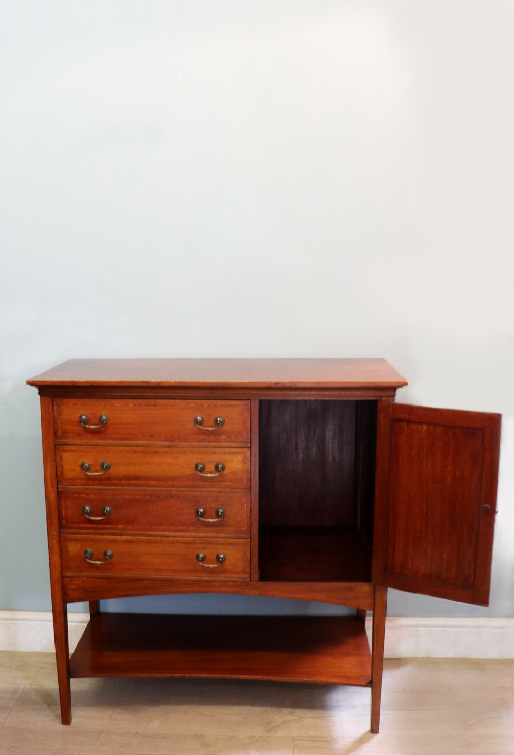 A wonderful early 20th century mahogany and inlaid combination music cabinet and cupboard. View VII