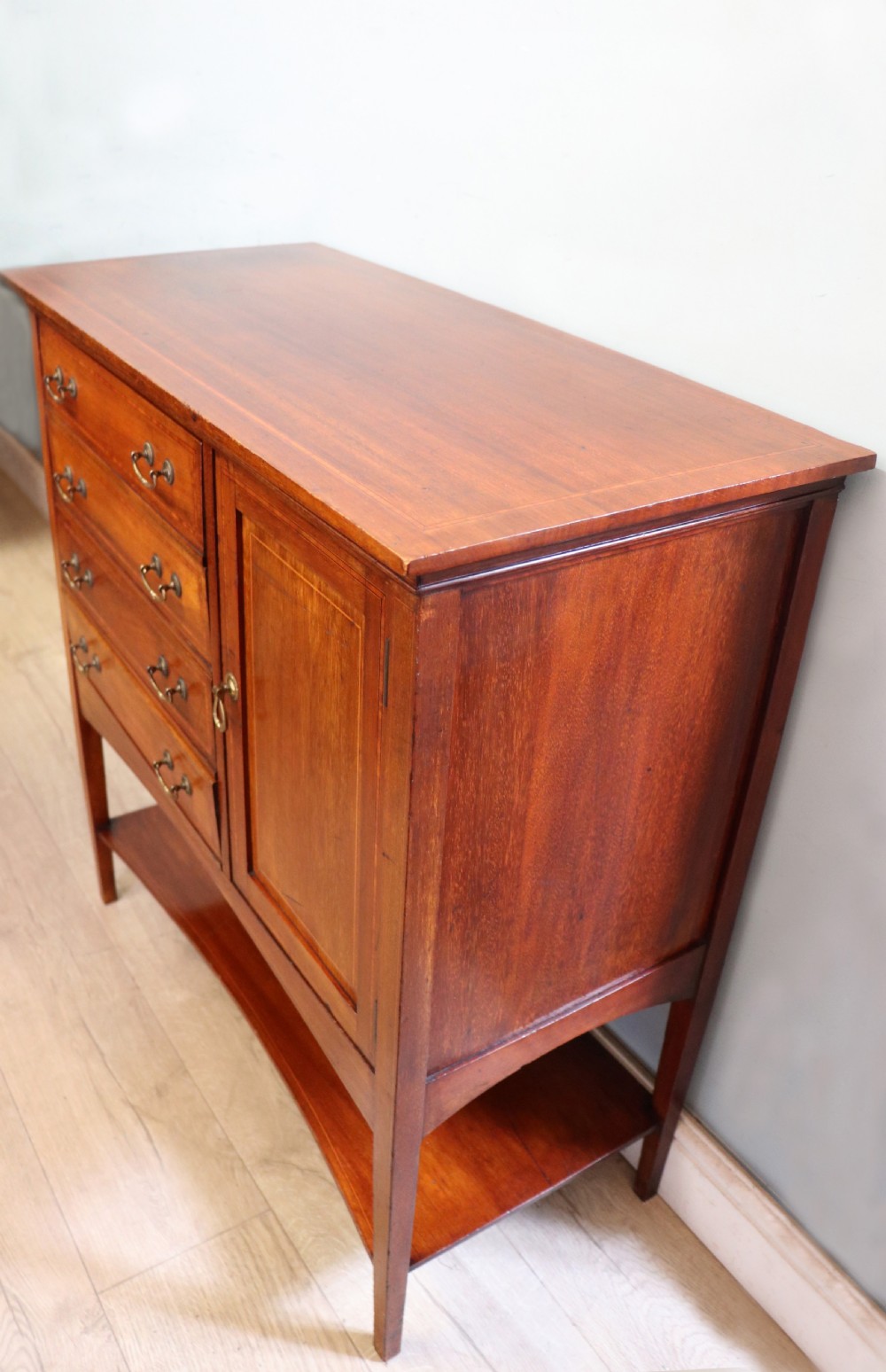 A wonderful early 20th century mahogany and inlaid combination music cabinet and cupboard. View IX