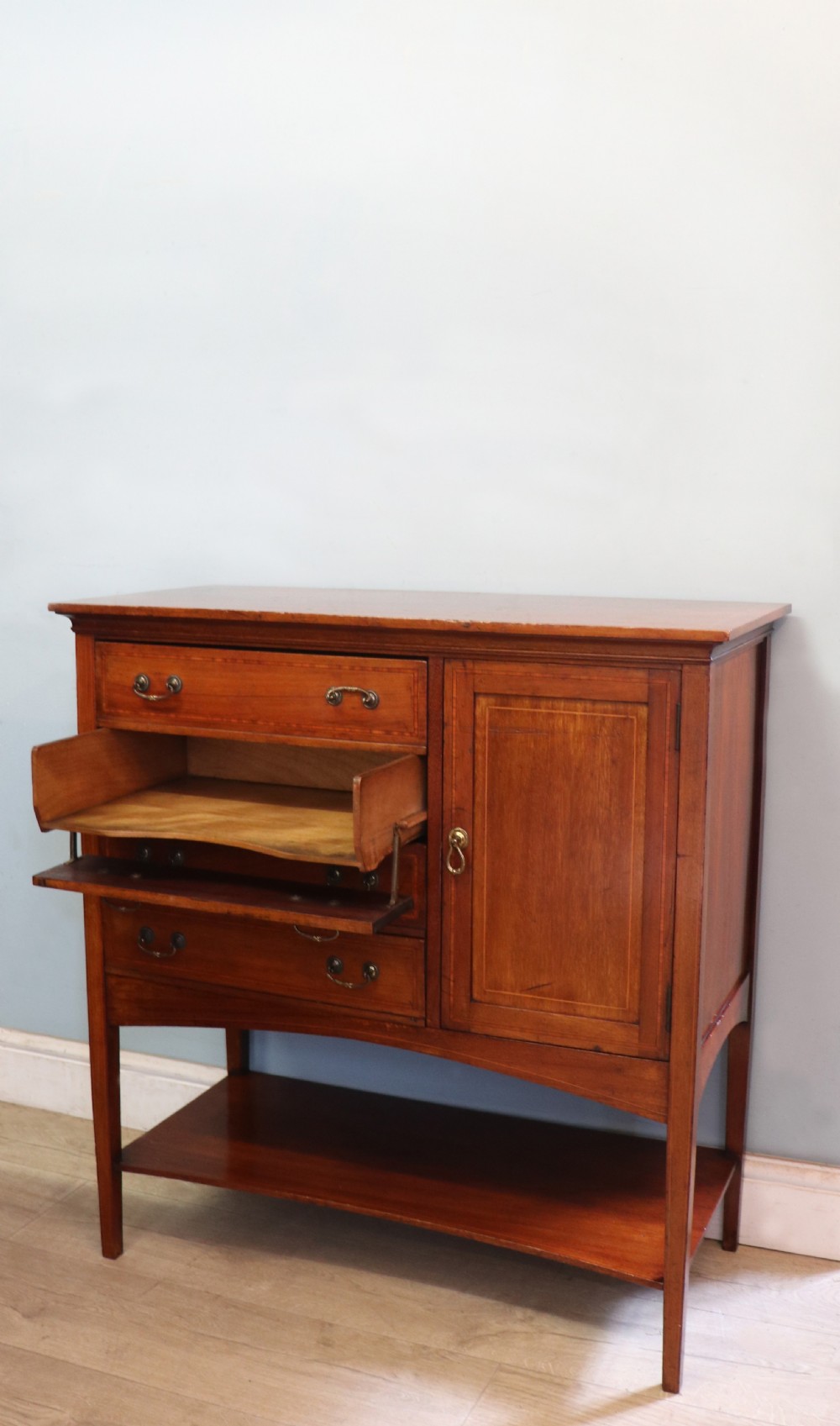 A wonderful early 20th century mahogany and inlaid combination music cabinet and cupboard. View XI