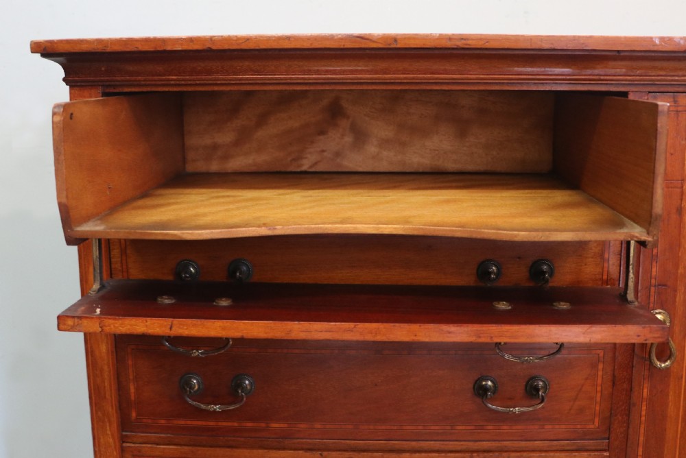 A wonderful early 20th century mahogany and inlaid combination music cabinet and cupboard. View XVII