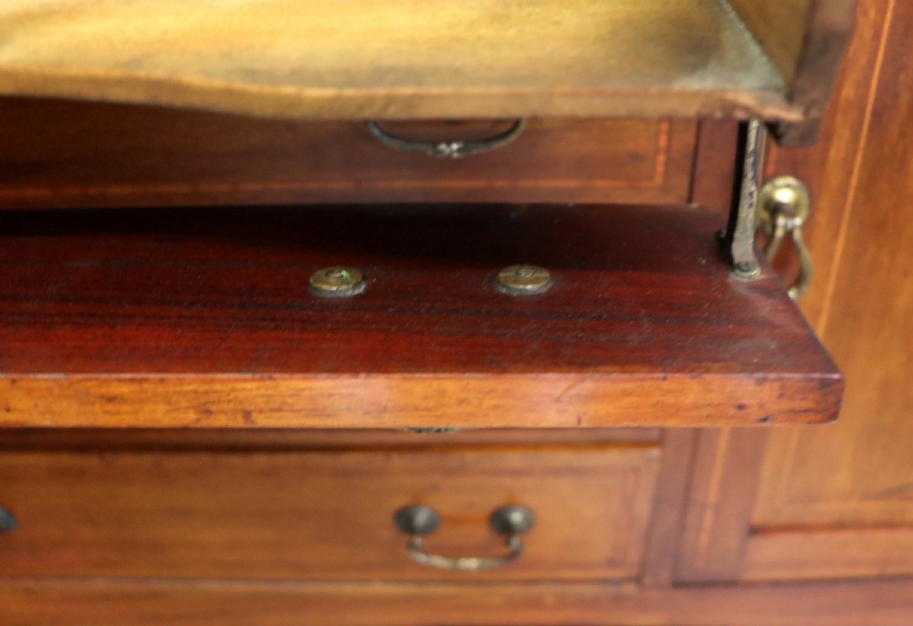 A wonderful early 20th century mahogany and inlaid combination music cabinet and cupboard. View XIX