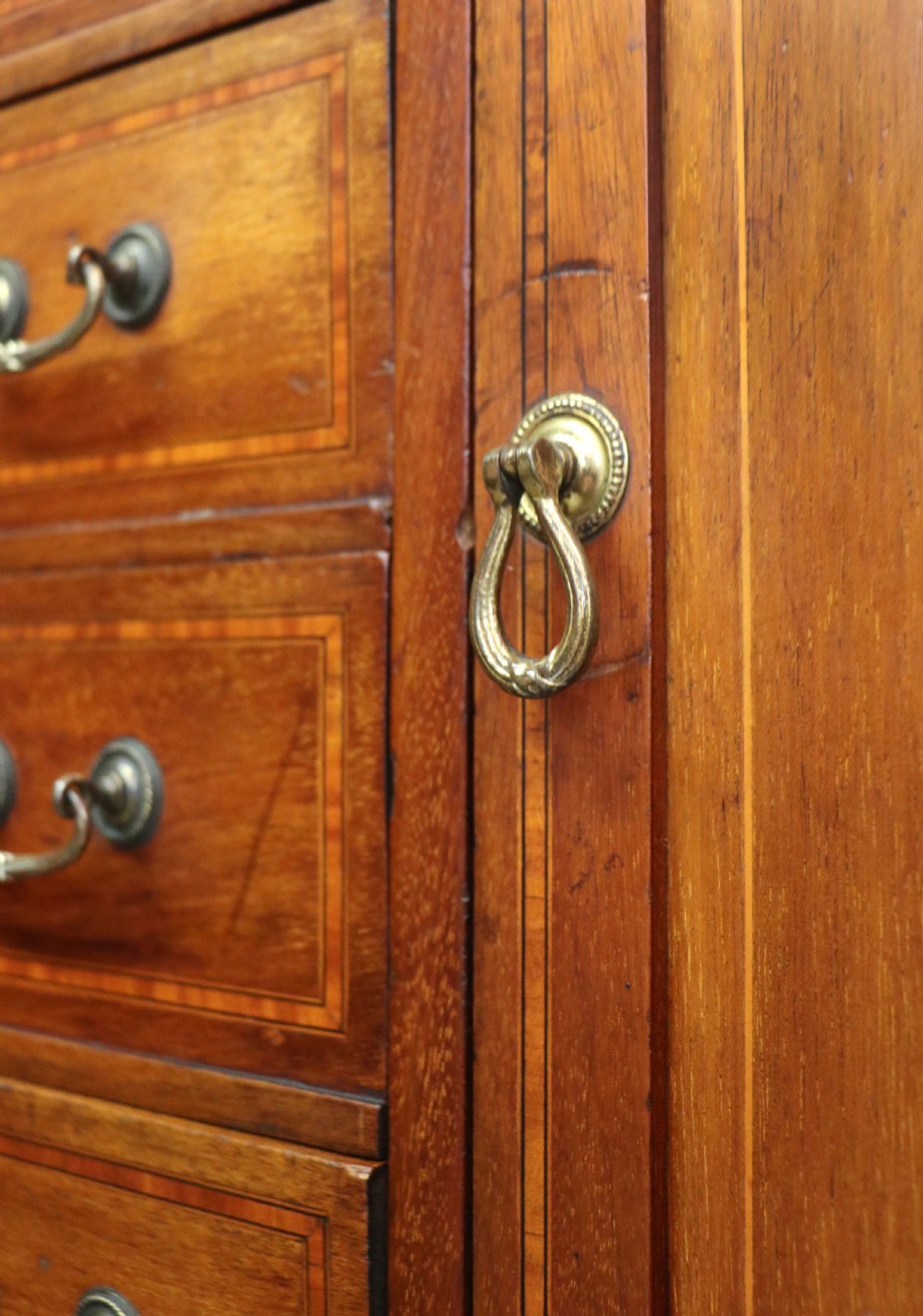 A wonderful early 20th century mahogany and inlaid combination music cabinet and cupboard. View XXI