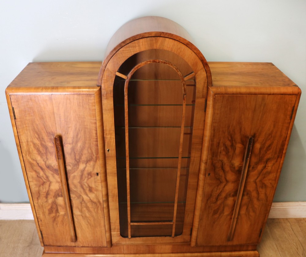 An absolutely lovely & unusual early 20th century walnut veneered side or display cabinet.