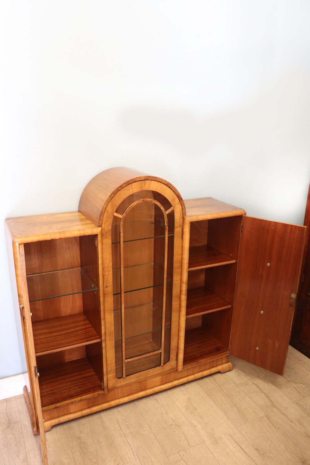 An absolutely lovely & unusual early 20th century walnut veneered side or display cabinet. View V