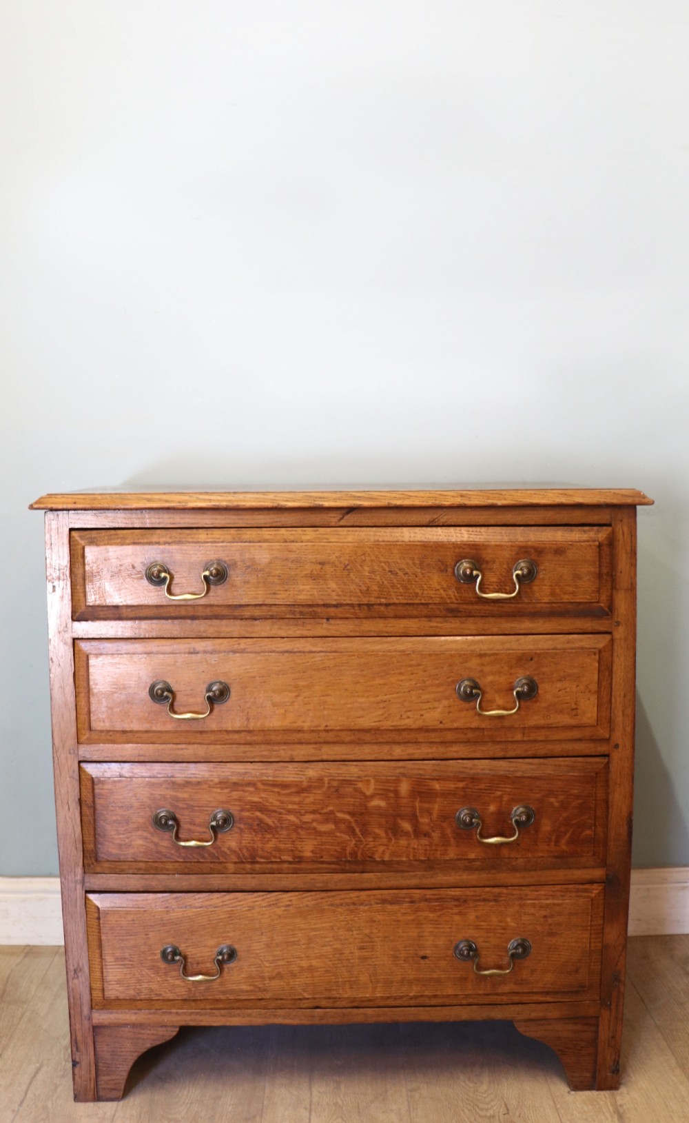 A 19th century or possibly earlier, diminutive Oak chest of four drawers. 