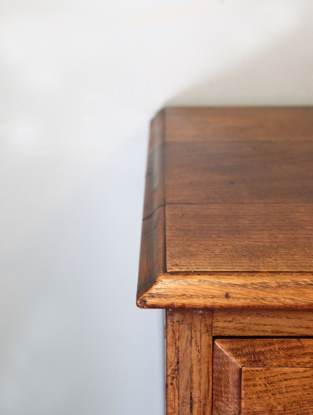 A 19th century or possibly earlier, diminutive Oak chest of four drawers.  View VIII