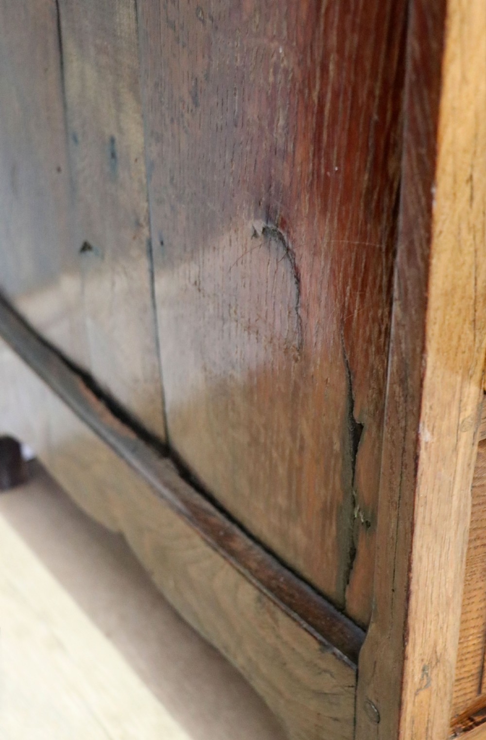 A 19th century or possibly earlier, diminutive Oak chest of four drawers.  View XVI