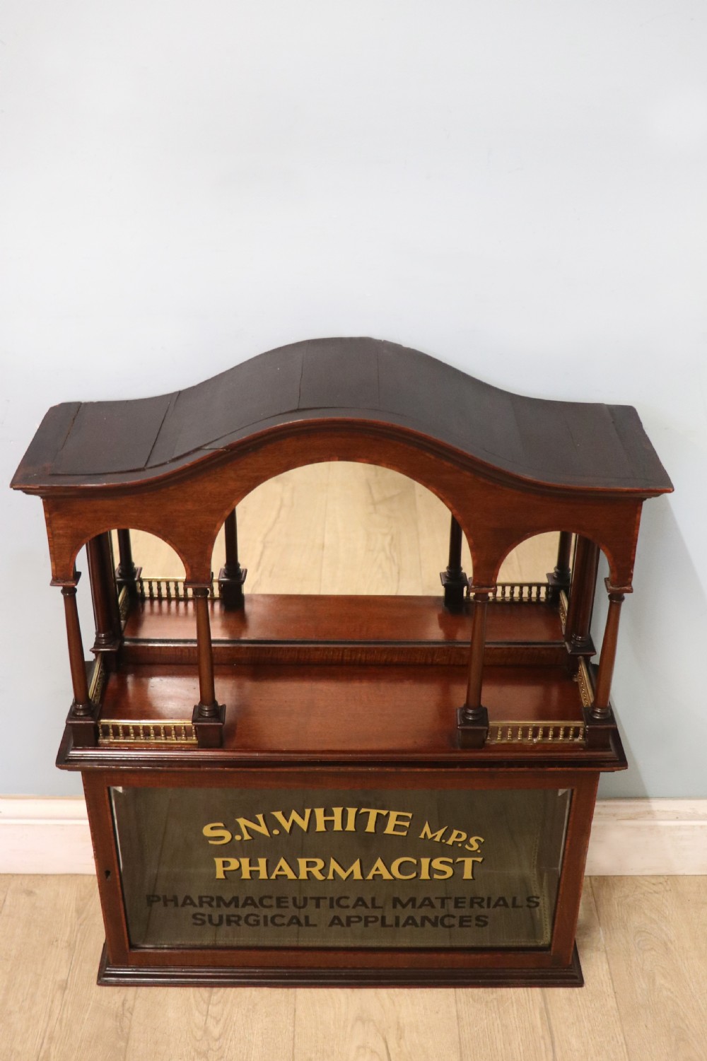 A stylish vintage apothecary cabinet by the renowned furniture makers Edwards & Roberts.  View II