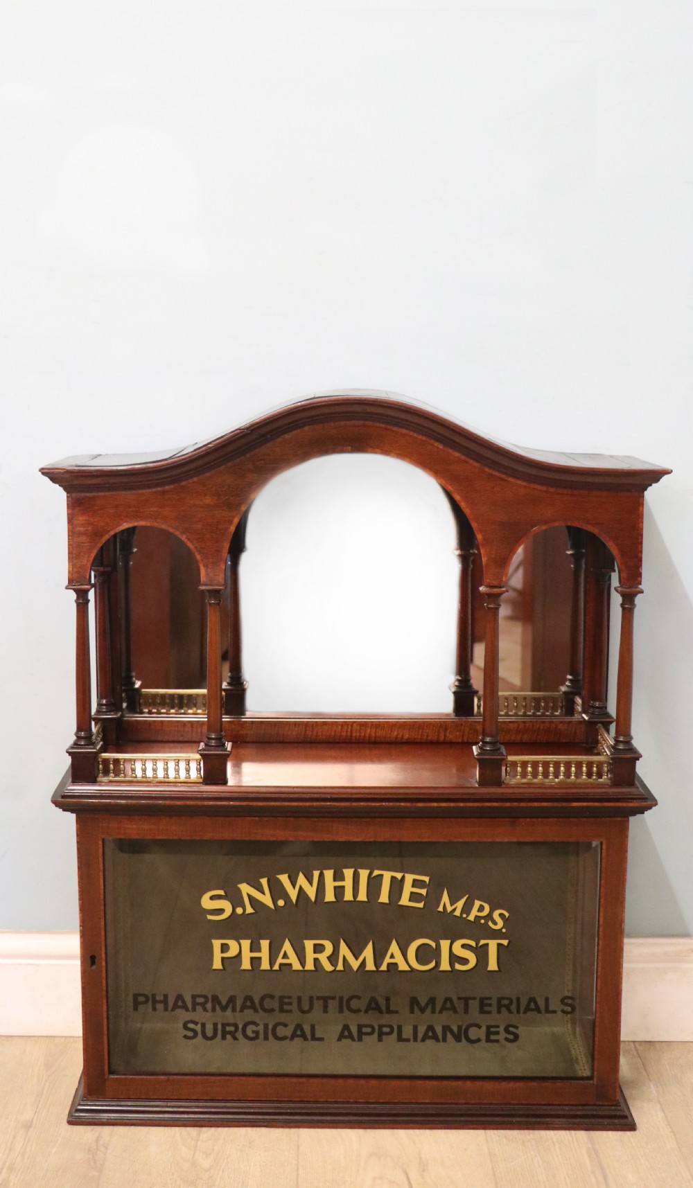 A stylish vintage apothecary cabinet by the renowned furniture makers Edwards & Roberts. 