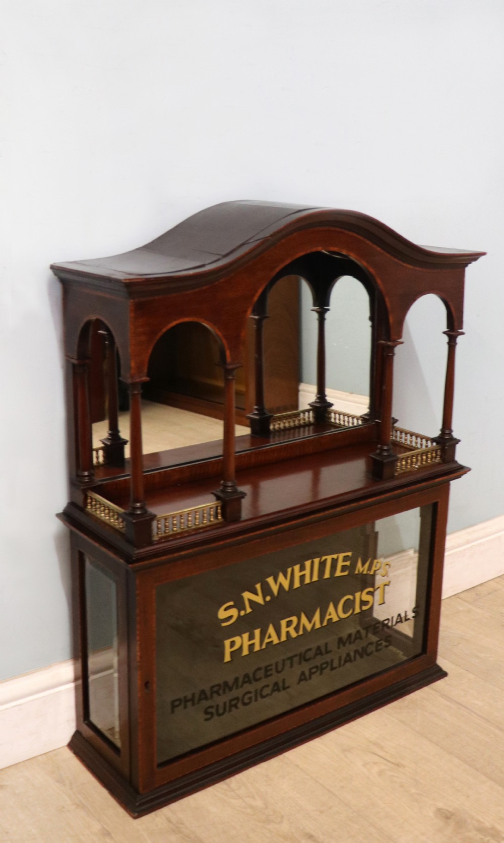 A stylish vintage apothecary cabinet by the renowned furniture makers Edwards & Roberts.  View III