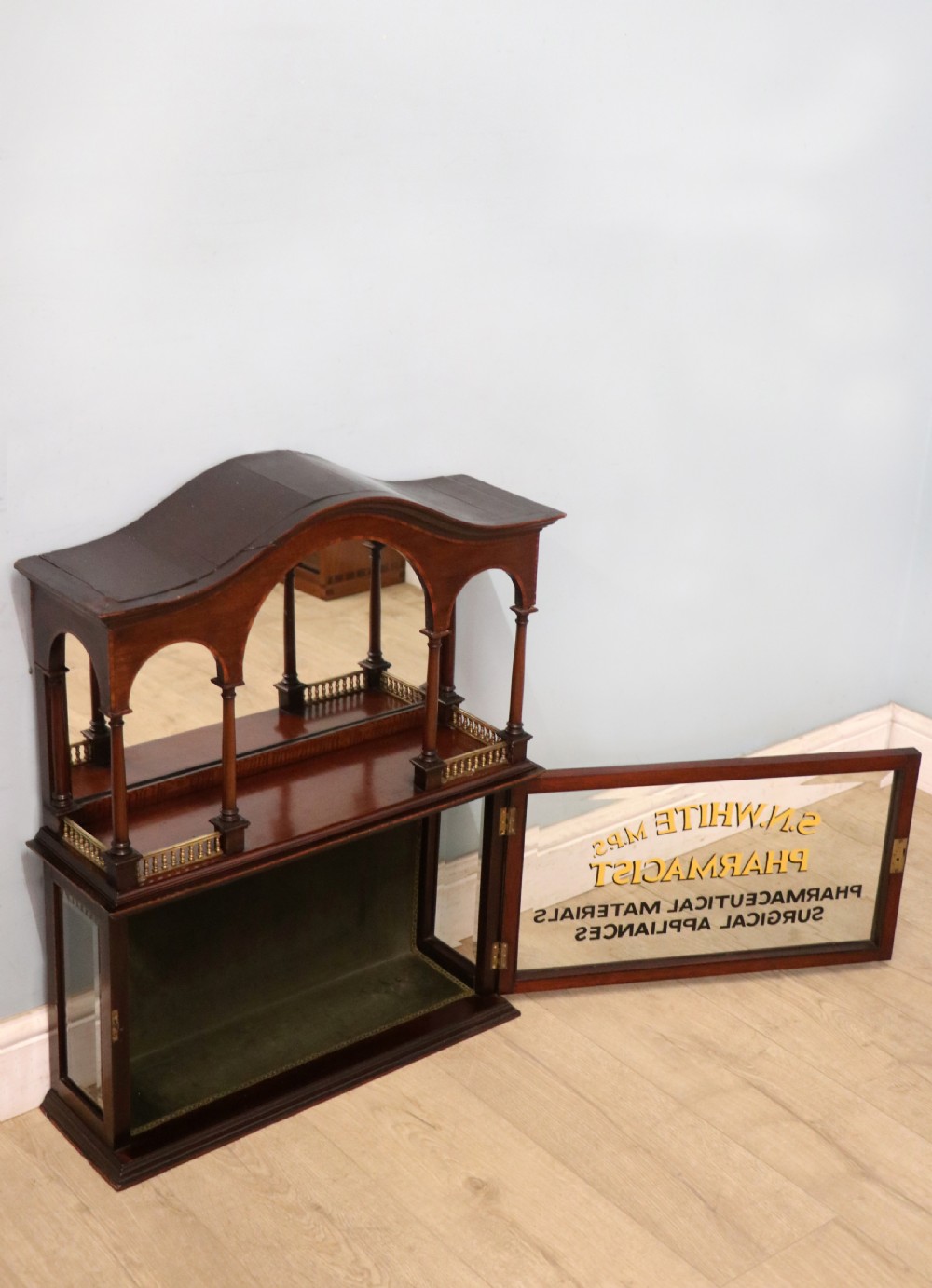 A stylish vintage apothecary cabinet by the renowned furniture makers Edwards & Roberts.  View VI
