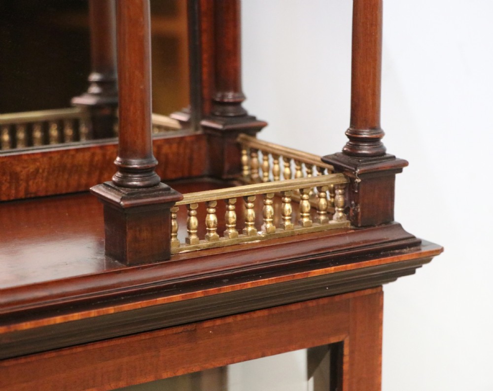 A stylish vintage apothecary cabinet by the renowned furniture makers Edwards & Roberts.  View XVI