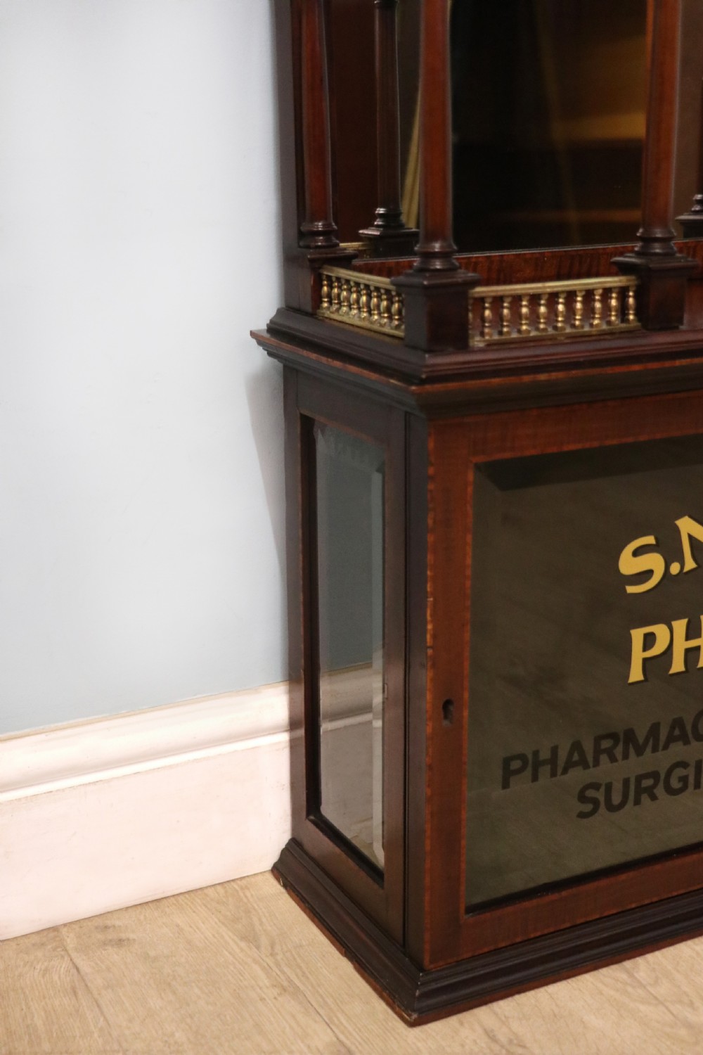 A stylish vintage apothecary cabinet by the renowned furniture makers Edwards & Roberts.  View XVIII