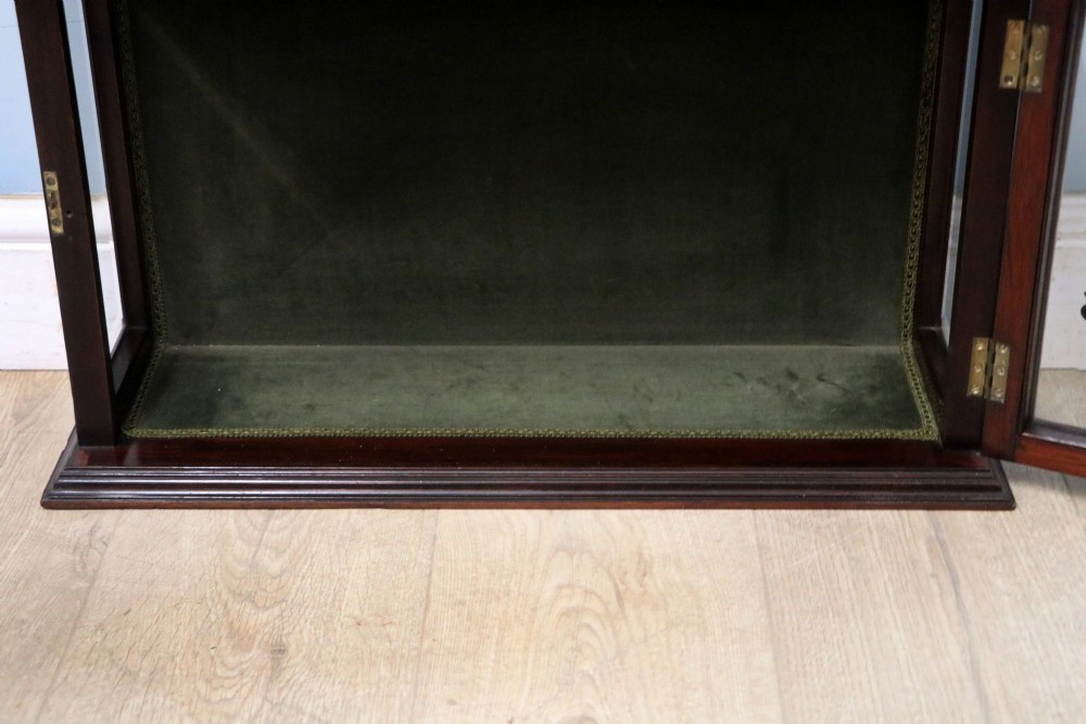 A stylish vintage apothecary cabinet by the renowned furniture makers Edwards & Roberts.  View XIX