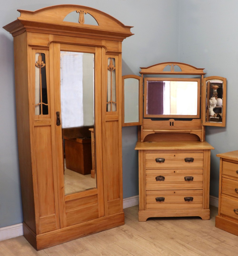 Victorian Arts and Crafts style. A lovely late 19th century satin walnut wardrobe and matching dressing chest.