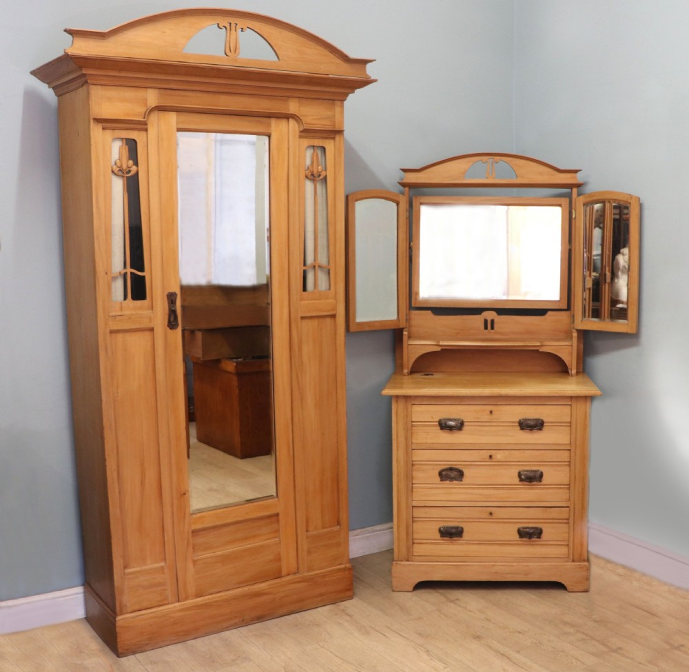 Victorian Arts and Crafts style. A lovely late 19th century satin walnut wardrobe and matching dressing chest. View II