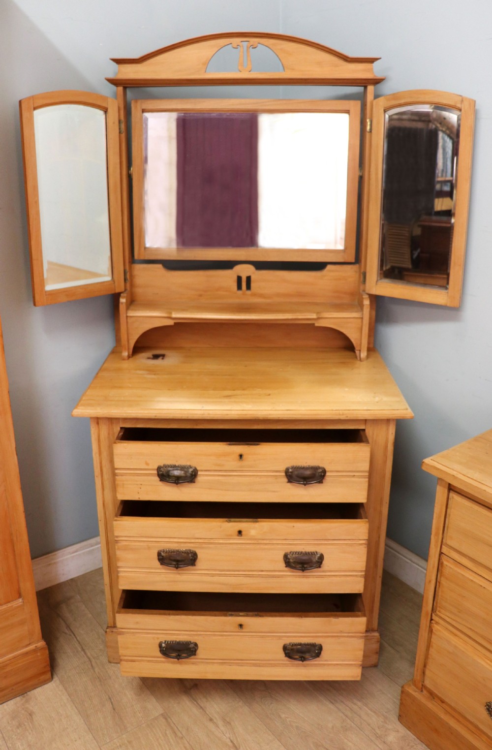 Victorian Arts and Crafts style. A lovely late 19th century satin walnut wardrobe and matching dressing chest. View IV