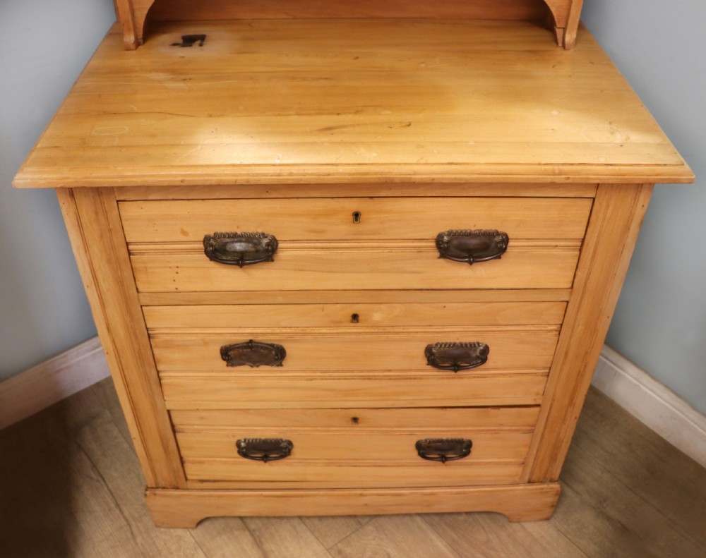 Victorian Arts and Crafts style. A lovely late 19th century satin walnut wardrobe and matching dressing chest. View XII