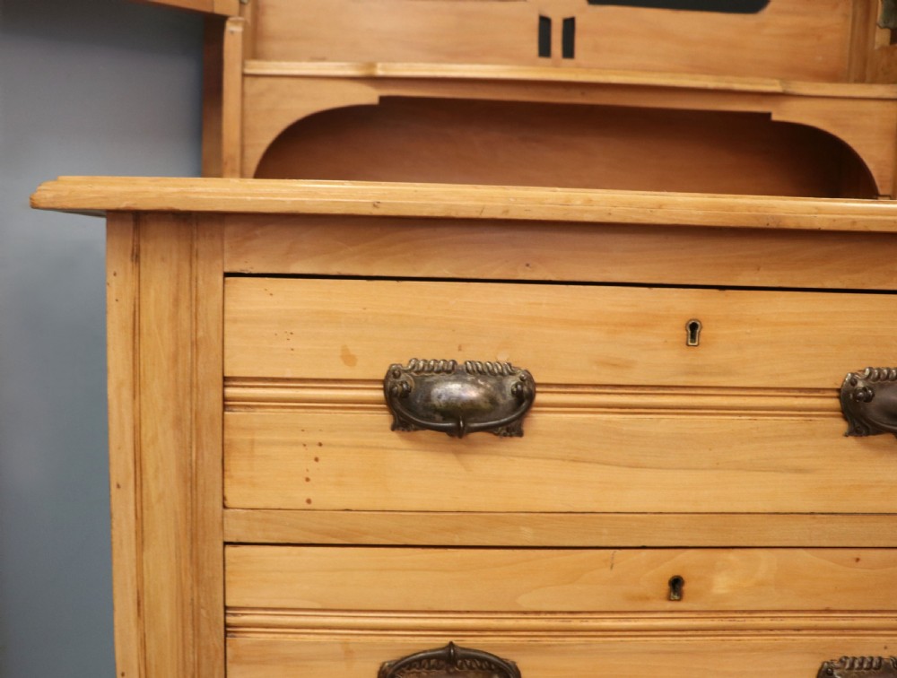 Victorian Arts and Crafts style. A lovely late 19th century satin walnut wardrobe and matching dressing chest. View XIV