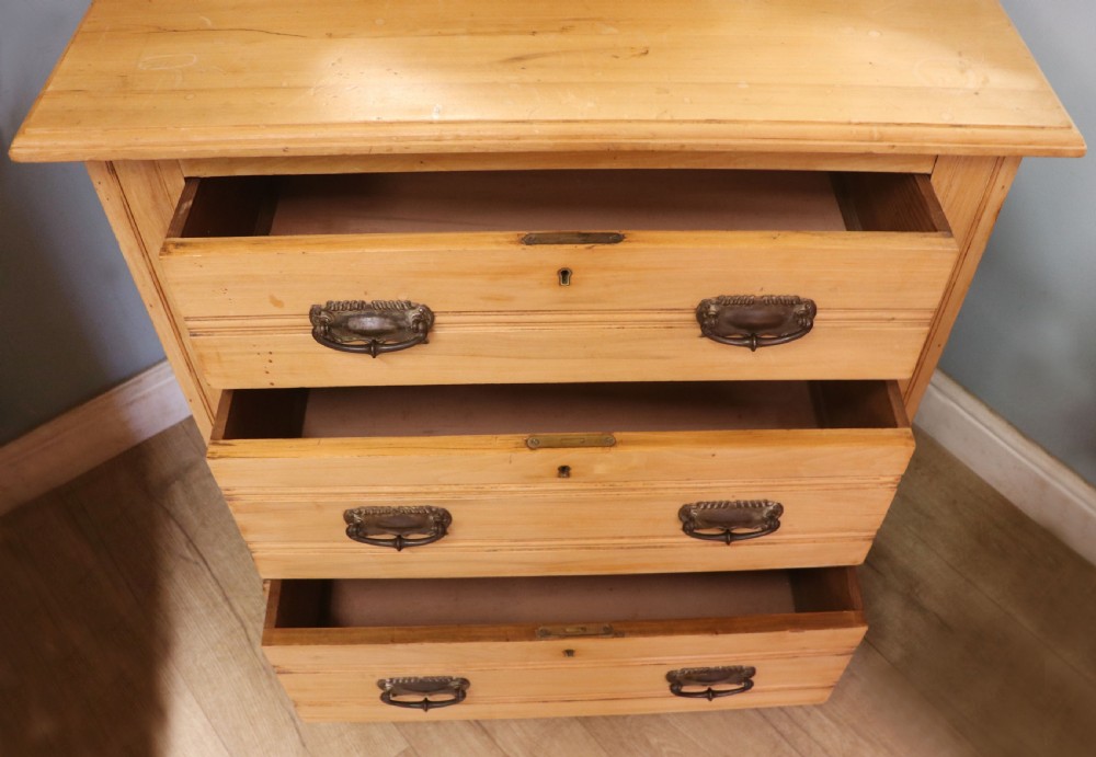 Victorian Arts and Crafts style. A lovely late 19th century satin walnut wardrobe and matching dressing chest. View XVI