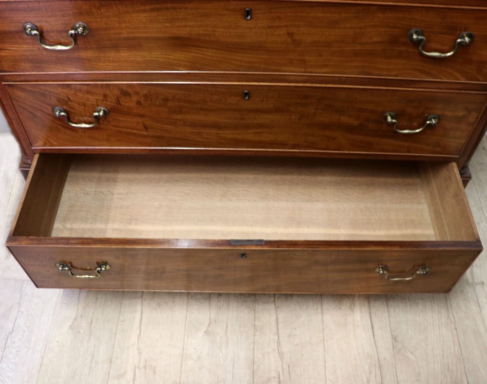 An absolutely delightful early 19th century mahogany chest of drawers. View VII