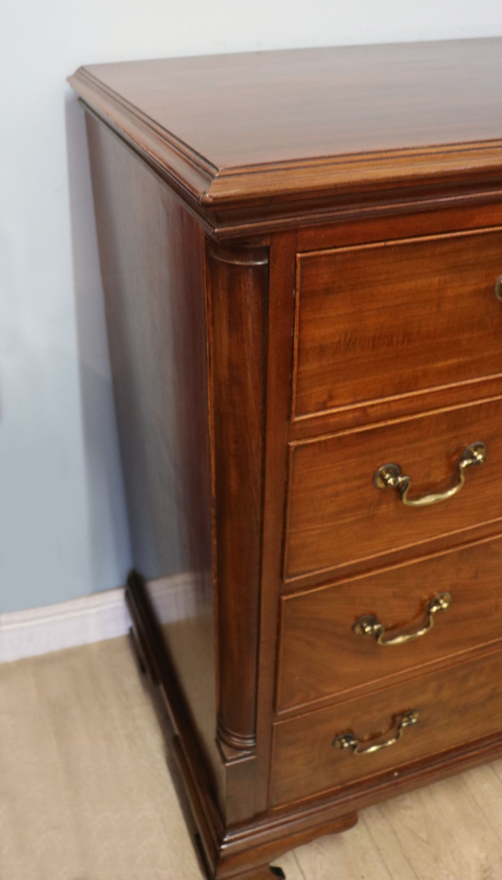 An absolutely delightful early 19th century mahogany chest of drawers. View XIX
