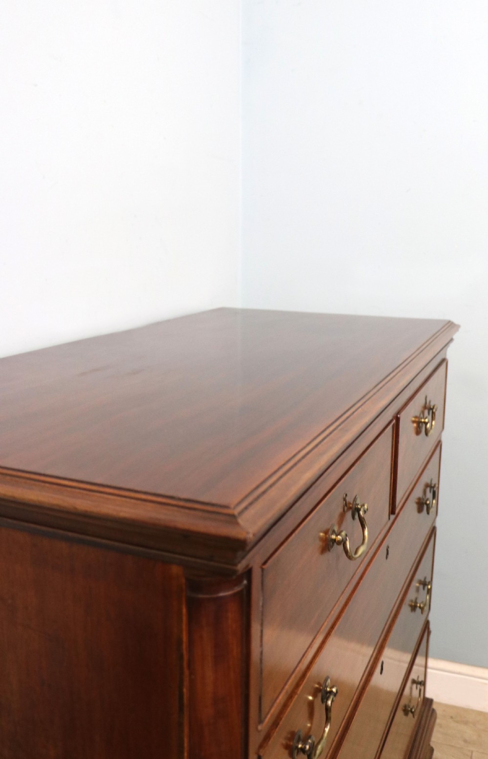 An absolutely delightful early 19th century mahogany chest of drawers. View XXI