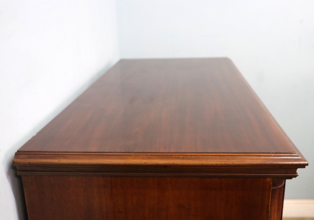 An absolutely delightful early 19th century mahogany chest of drawers. View XXIII