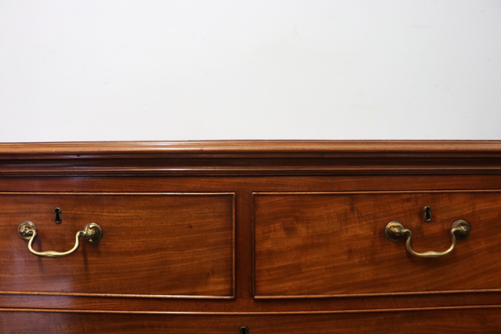 An absolutely delightful early 19th century mahogany chest of drawers. View XXIV