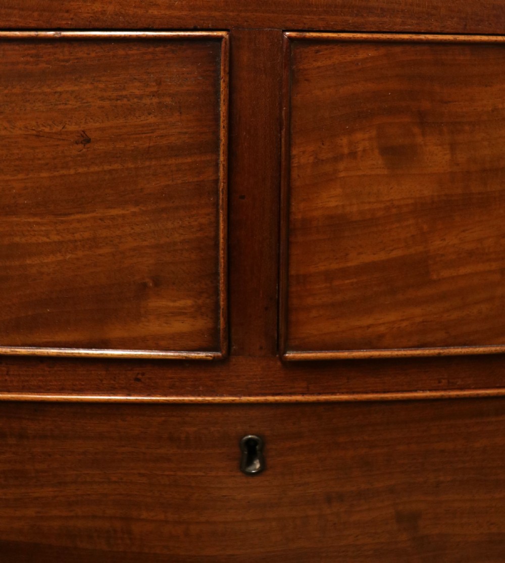 An absolutely delightful early 19th century mahogany chest of drawers. View XXVI