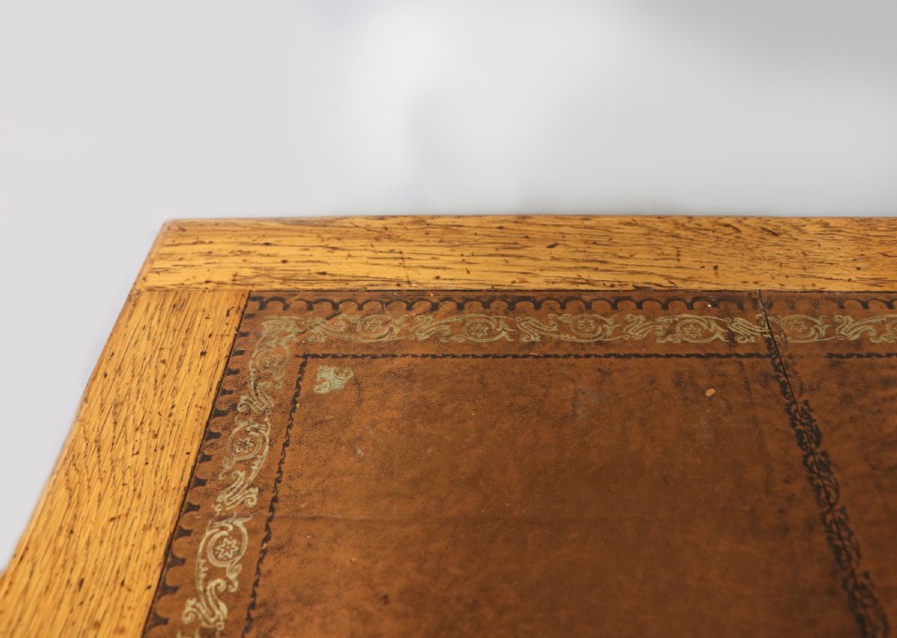 Victorian quality! A lovely late 19th century light oak twin pedestal desk.  View V