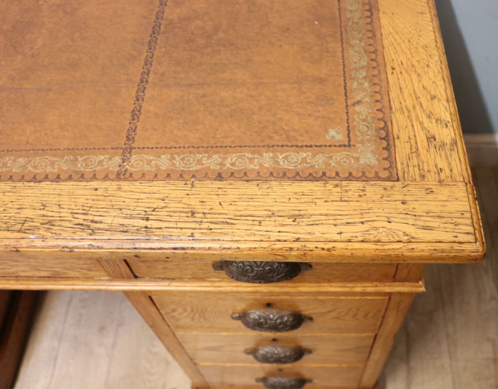 Victorian quality! A lovely late 19th century light oak twin pedestal desk.  View XI