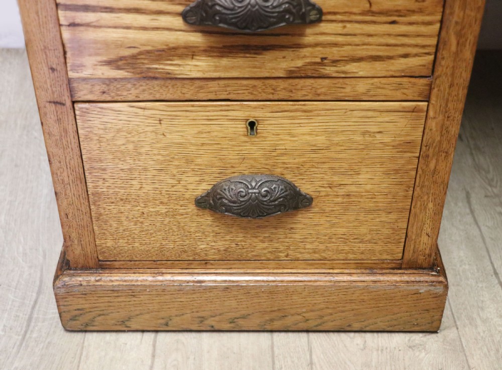 Victorian quality! A lovely late 19th century light oak twin pedestal desk.  View XXI