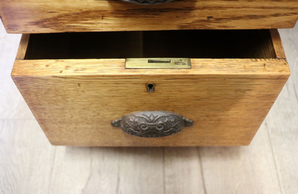 Victorian quality! A lovely late 19th century light oak twin pedestal desk.  View XXII