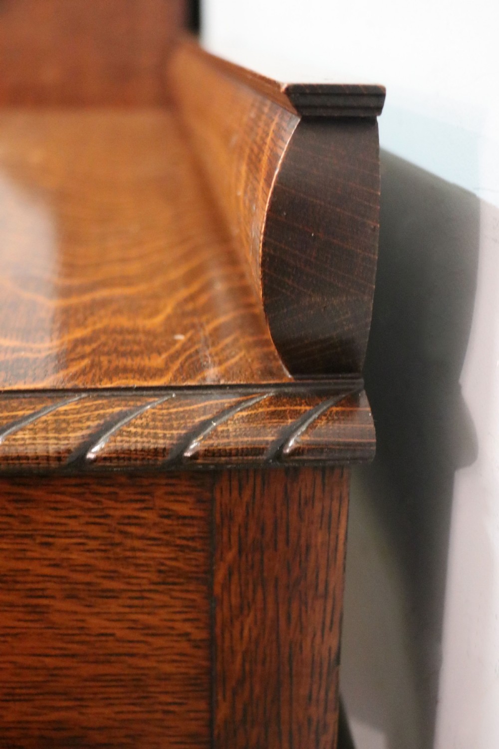A Georgian revival oak side table featuring a single drawer with brass knobs, a lower tier shelf, and cabriole legs terminating in carved claw and ball feet. View XVI