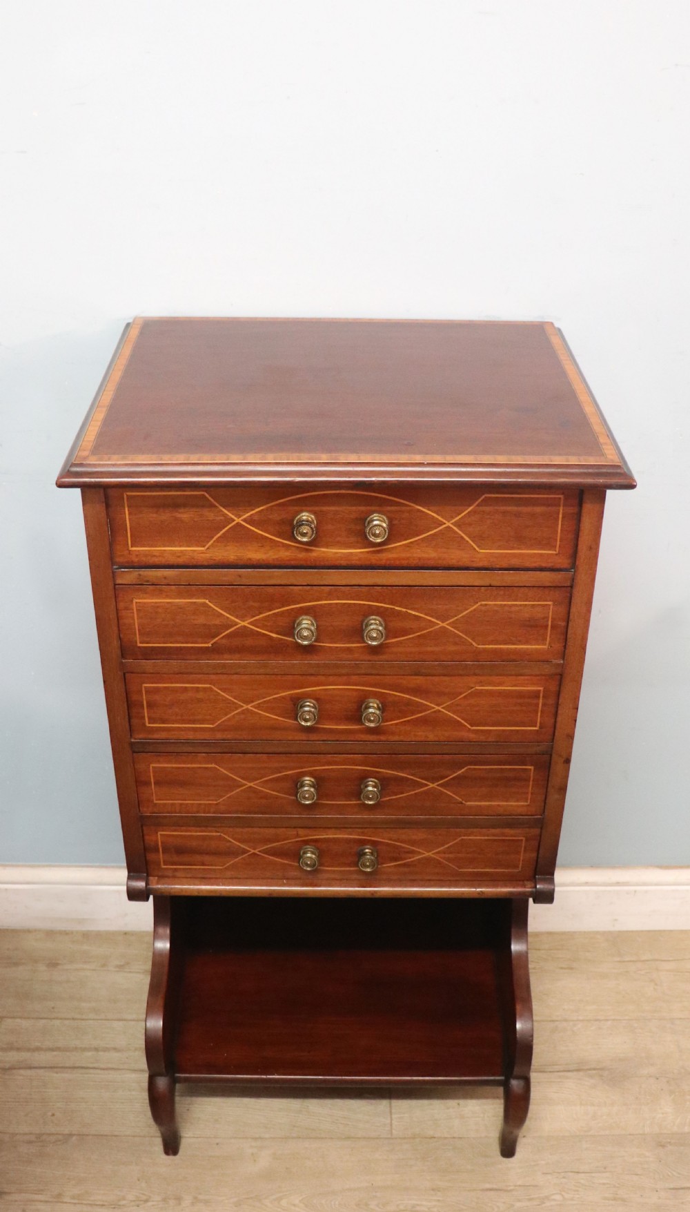 A lovely narrow mahogany and line inlaid music cabinet or chest of drawers View II