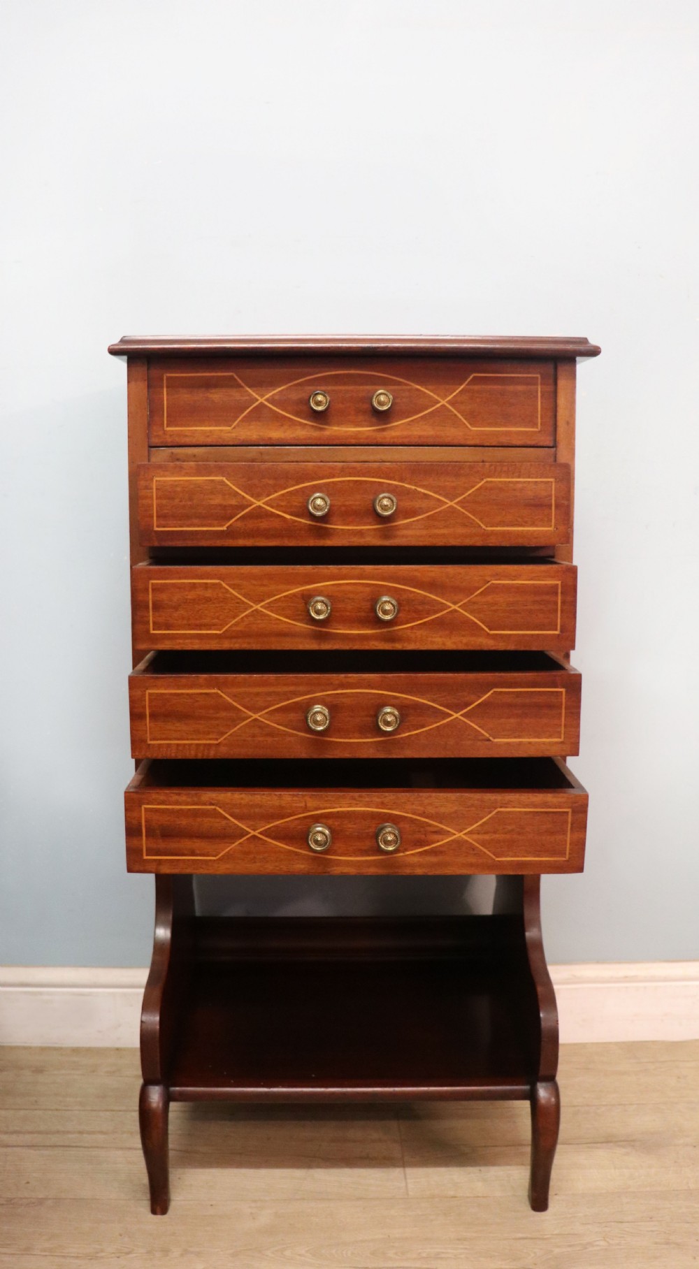 A lovely narrow mahogany and line inlaid music cabinet or chest of drawers View V