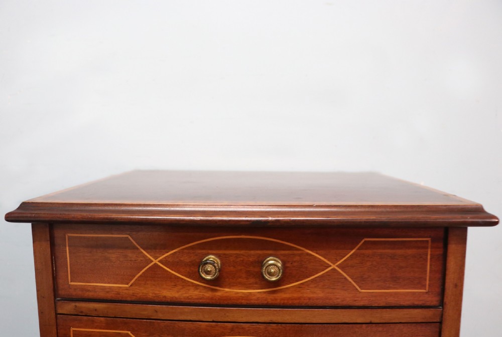 A lovely narrow mahogany and line inlaid music cabinet or chest of drawers View XII
