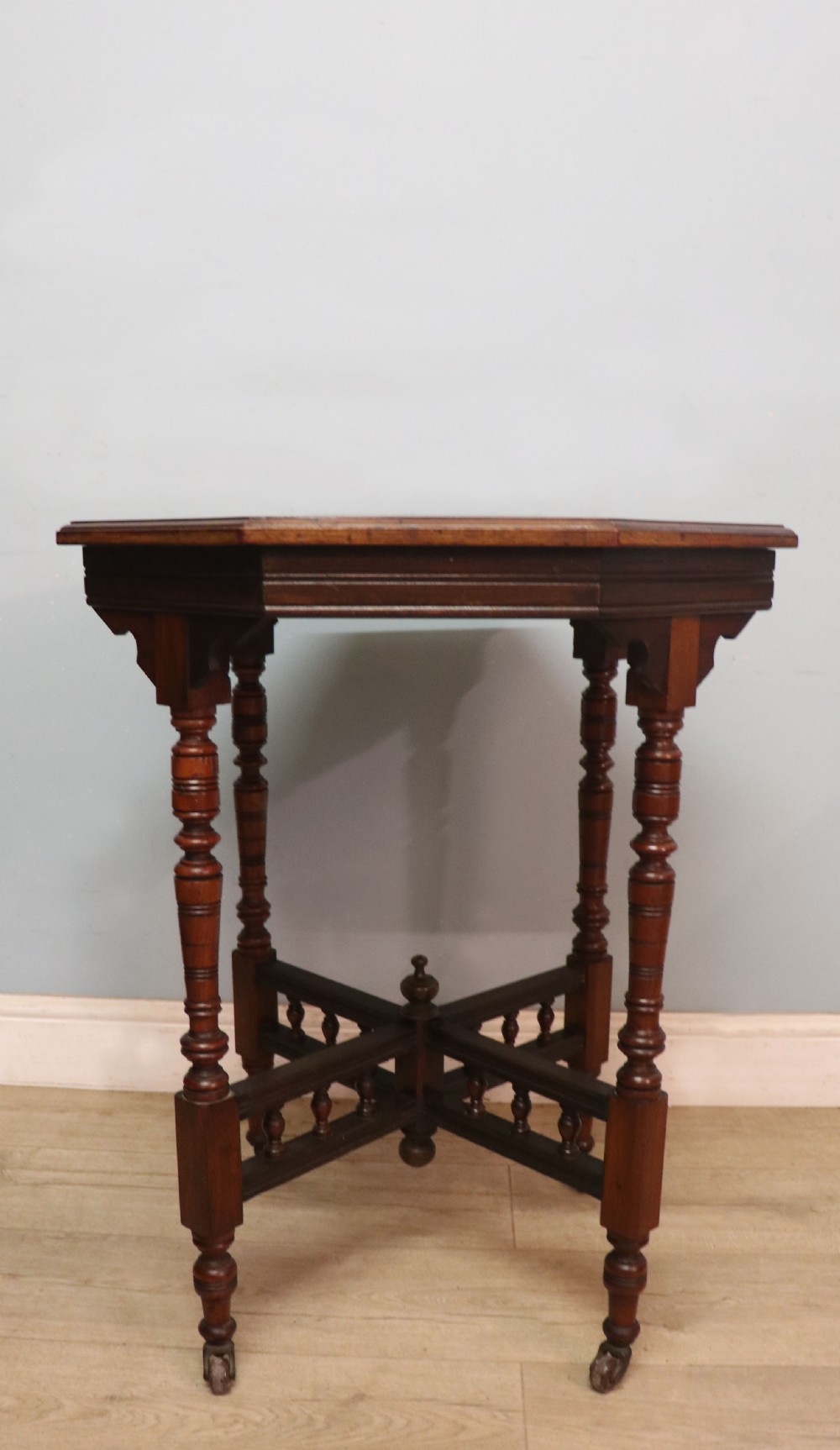 A Late Victorian lovely American walnut octagonal lamp table. View II